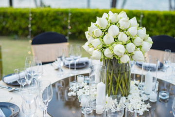 Table setting at a luxury wedding and Beautiful flowers on the table.