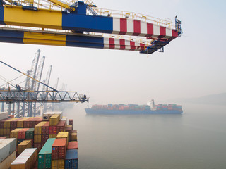 Containers vessels in Nhava Sheva port during cargo operation.