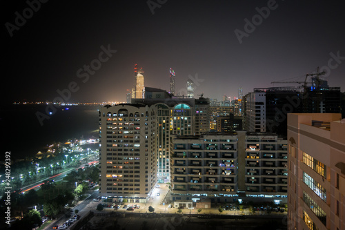 High Shot Of Abu Dhabi Skyline And City Towers At Night Corniche