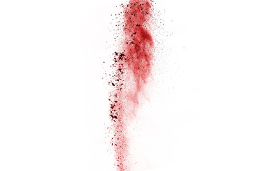 Freeze motion of red powder exploding, isolated on white background. Abstract design of red dust cloud. Particles explosion screen saver, wallpaper