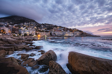 wide angle view of a seascape scene in seapoint in cape town south africa