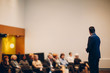 © primipil - Speaker on stage in business conference.