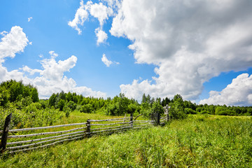 Russia. View of the village. Summer rural landscape with houses