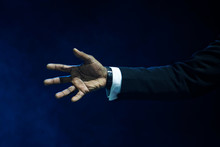 Hand Of A Black Man With An Open Palm. A Welcome Gesture For A Handshake