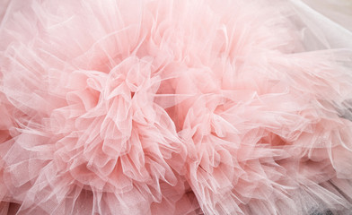 Wall Mural - draped background of pink powdery fabric in the form of tulle, texture
