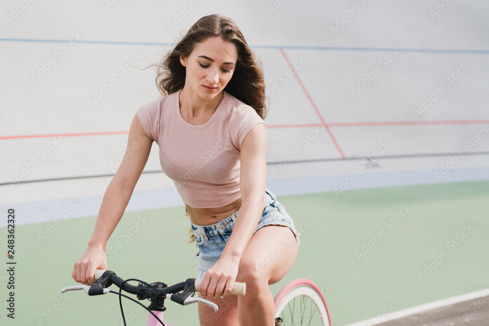 Woman beautiful cycling shop