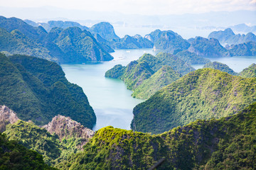 Poster - scenic view over Ha Long bay from Cat Ba island, Ha Long city in the background, UNESCO world heritage site, Vietnam