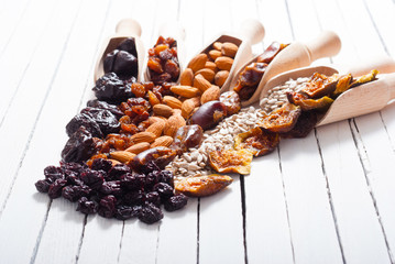 Wall Mural - dried super foods on white wood table background