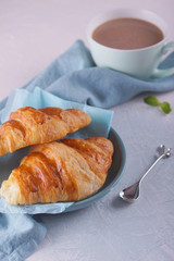 Wall Mural - Breakfast with fresh croissants.