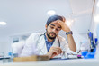 © Dragana Gordic - Overworked doctor in his office