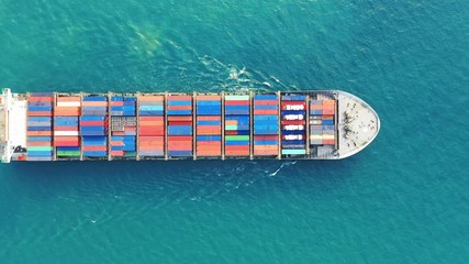 Wall Mural - Aerial view of container cargo ship in sea.