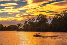 Sunset Over Murray River With A Boat In Mildura, Australia