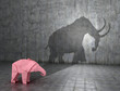 Concept of hidden potential. A paper figure of a elephant that fills the shadow of a mammoth. 3D illustration
