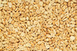  Roasted peanuts, salted snack. Peeled peanuts for background, top view.