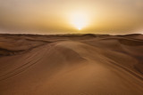 Fototapeta  - Sunset in desert in UAE, Sand dunes in United Arab Emirates