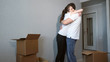 © lenblr - Young couple very happy and excited about moving into new apartment.