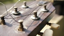 Close Up Image Of Part Of An Acoustic Guitar