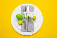 Easter Eggs, Green Color Painted In A White Plate, Yellow Background, Top View