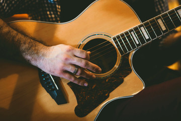 Wall Mural - Playing classic guitar. Selective focus.