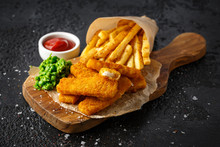 Fish Fingers, Mashed Peas And Chips Fries. Traditional British Fast Food