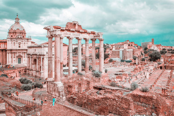 Wall Mural - Panoramic view of Roman Forum with ancient ruins of temple, columns of Saturn, Triumphal Arch of Septimius Severus, Rome, Italy