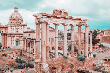  Panoramic view of Roman Forum with ancient ruins of temple, columns of Saturn, Triumphal Arch of Septimius Severus, Rome, Italy
