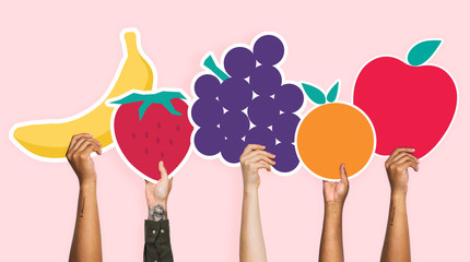 Canvas Print - Hands holding a set of fruits clipart