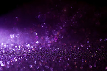 Purple Glitter Magic Background. Defocused Light And Free Focused Place For Your Design.