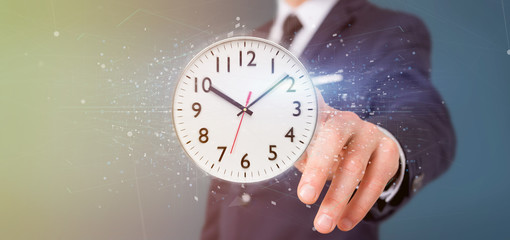 Poster - Man holding a clock timer 3d rendering