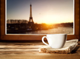 Fototapeta  - Coffee and Paris landscape. Free space for your decoration. Sunset time. 
