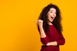 Close up photo cool beautiful nice cheerful amazing her she lady showing way one arm thumb wealth hair shoulders chic wearing red knitted sweater pullover clothes outfit isolated yellow background