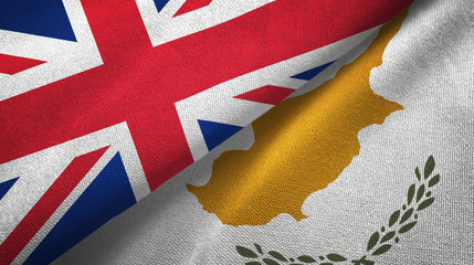 United Kingdom and Cyprus two flags textile cloth, fabric texture