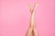 Leinwandbild Motiv Cropped close-up image view photo of nice perfect long attractive feminine fit thin slim soft smooth shine shaven legs ad advert isolated over pink pastel background