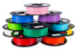 © stockphoto-graf - colorful bright stack pile of spool 3d printer filament