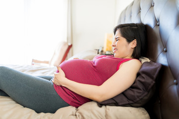 Woman Suffering From Braxton Hicks Contractions