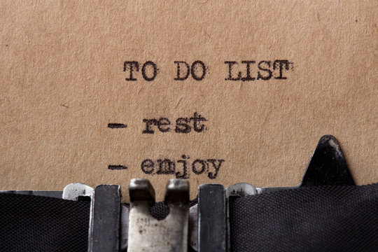 To do list sleep, relax, enjoy - text message on the typewriter close-up