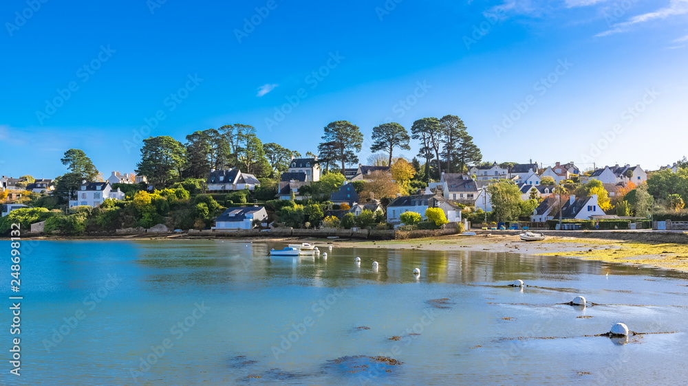 Brittany, Ile aux Moines island in the Morbihan gulf, the typical harbor and village, low tide  - obrazy, fototapety, plakaty 