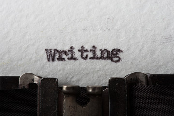 Leinwandbilder - close up image of typewriter with paper sheet. Writing text