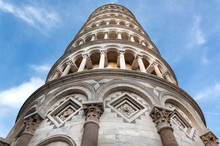 Blue Sky Over 14th Century Leaning Tower Of Pisa, Italy. UNESCO World Heritage Site