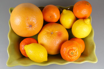 Dish of citrus on a table