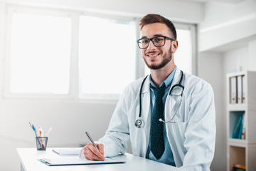 Wall Mural - Young Doctor on the Job