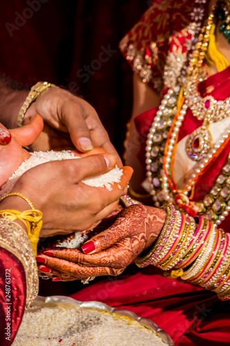 Groom Pours Rice As A Symbol Of Plenty And Wishes For Wealth At A South Indian Wedding Ceremony In Hyderabad India Buy This Stock Photo And Explore Similar Images At Adobe