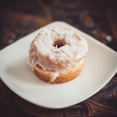 Wall Mural - Coconut Cronut on a white plate
