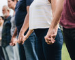 © Rawpixel.com - Happy diverse people holding hands in the park