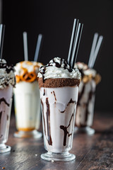 Poster - crazy milkshakes with chocolate, caramel and whipped cream