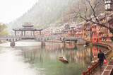 Fototapeta Paryż - One of the traditional bridges over the Tuojiang River (Tuo Jiang River) in Fenghuang old city (Phoenix Ancient Town),Hunan Province, China.