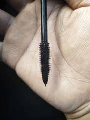 black  mascara on hand