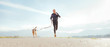 © Soloviova Liudmyla - Running man with his dog . Active healthy lifestyle concept image.