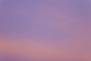 Wall Mural - Red clouds on blue sky in twilight evening. Beautiful sunset sky with blue and red background. Dramatic colorful of dusk and dawn sky with blue sky and red clouds.