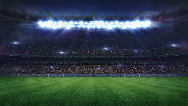 Wall Mural -  - grand football stadium middle view illuminated by spotlights and empty green grass